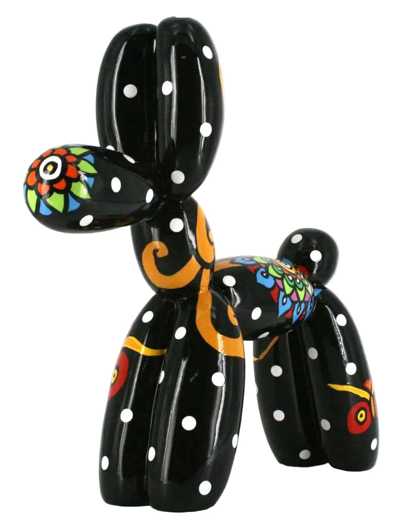 Black balloon dog with white polka dot sculpture and colorful patterns