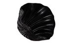 A black shell-shaped decorative bowl or dish with a textured, ribbed exterior and smooth, glossy interior.