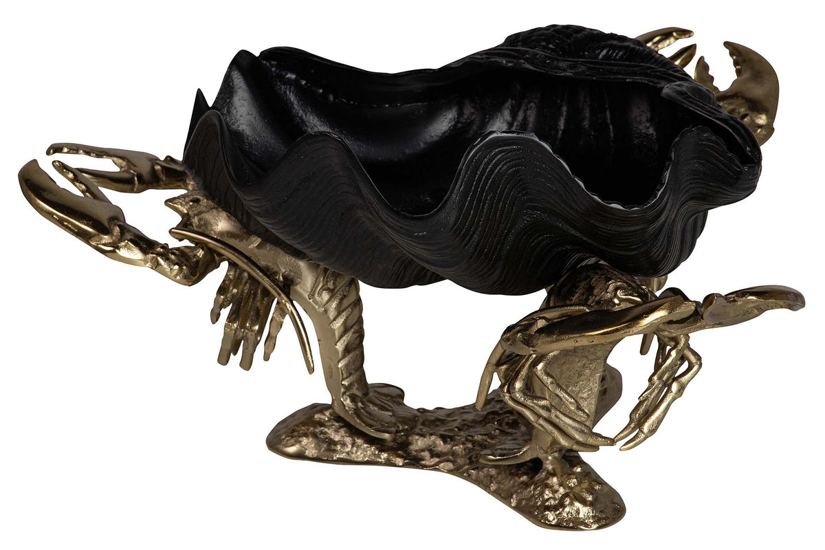 A decorative lobster figurine with a glossy black shell and metallic gold claws and base.
